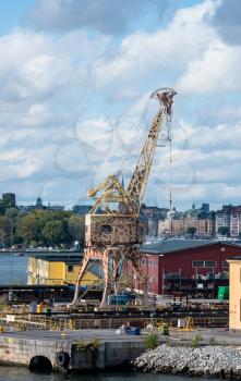 STOCKHOLM, SWEDEN - SEPTEMBER 10: Crane like a giraffe on September 10, 2017 in Stockholm, Sweden. The giraffe cranes were moved here from Hammarby dockyard