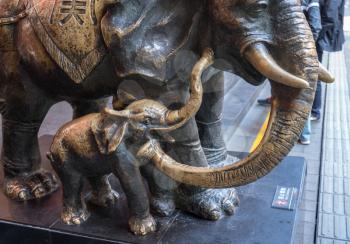 Mother and baby elephant statue rubbed  to bronze color for good luck
