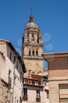 Exterior view of the bell tower and carvings on the roof of the old Cathedral in Salamanca