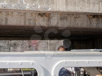 Little headroom above river cruise boat as it rises inside the lock of the Valeira dam on River Douro in Portugal
