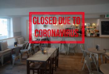 Background defocused image of interior of bar or restaurant closed due to coronavirus or covid-19