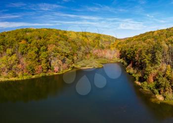 Aerial drone image of the Coopers Rock Lake and Glade Run in the state park in the autumn. Located near Morgantown WV