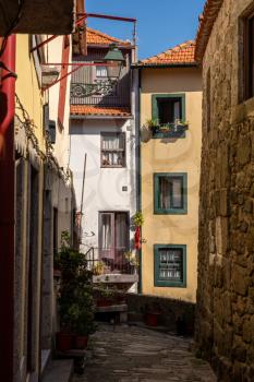 Narrow cobbled streets lead to homes and apartments in the old town of Porto