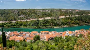 Colorful old village of Novigrad in Istria county of Croatia with blue river and harbor seen from the fortress