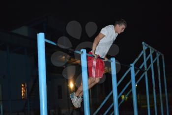 Yard gymnastics. Classes are on the horizontal bar and parallel bars.