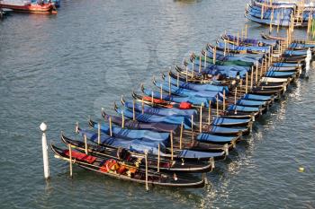 Venice, Italy - May 29, 2016: Boats near the coast in Venice. River individual transport