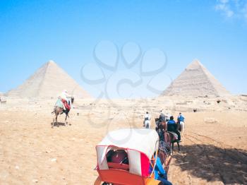 Giza, Egypt - May 23, 2017: The man and the camel. Tour of the ruins of ancient Egypt.