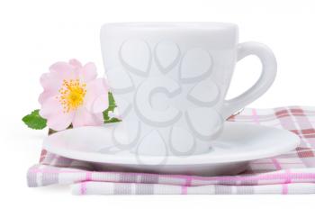 Cup of coffee,  rose and plate on a white background