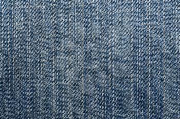 Macro shoot of blue jeans seamless background.
