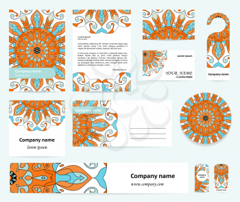 Stationery template design with mandalas motif in blue and orange colors. Documentation for business.