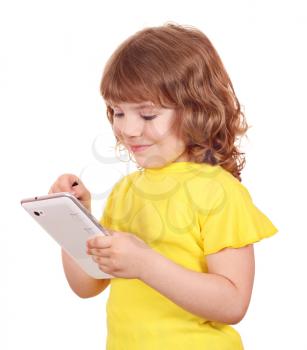 happy little girl playing with tablet