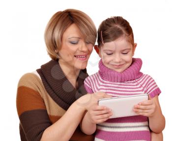little girl and mother play with tablet pc