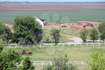 farm with horses aerial view