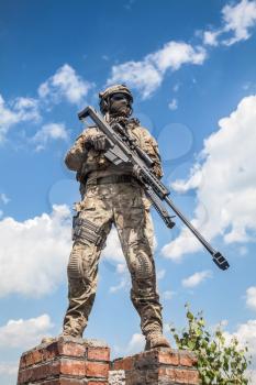 US Army ranger sniper with huge rifle