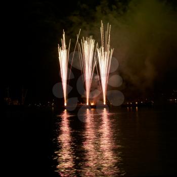 Salute, fireworks with the black sky background.