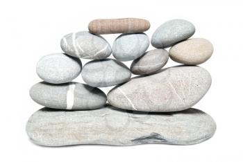 Wall of gray pebbles isolated on white 