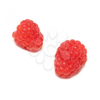 Two raspberries isolated on the white background