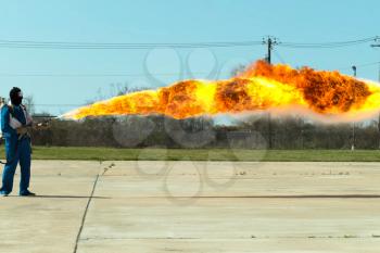 Flamethrower in action. a Flamethrower operational test.