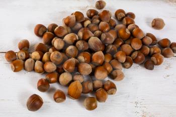 Hazelnuts on white wooden background. Nut. Healthy food. Snack. Nutrition. Healthy eating
