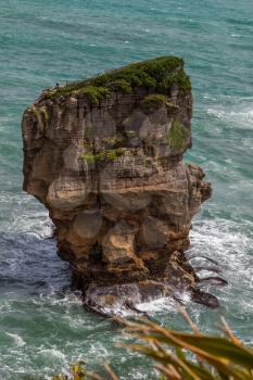A small stack of Pancake Rocks near Punakaiki in New Zealand