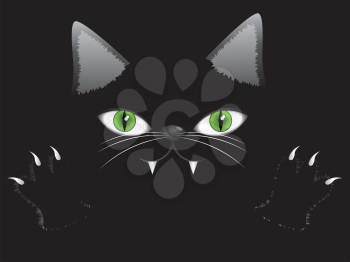 Cartoon halloween cat face with green eyes and paws on black background.