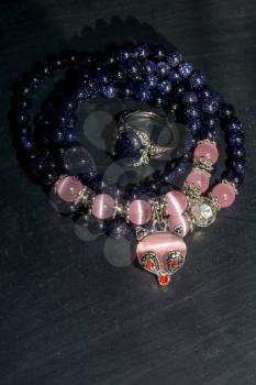 Fashion bracelet made of blue sand stone, aventurine with pink opal beads.