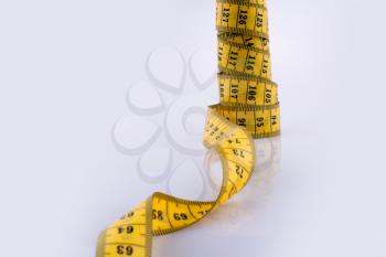 Measuring tape on a white background