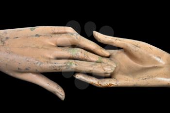 Weathered hands of plastic mannequin doll.