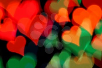 Colorful hearts abstract blur at night. Valentine's day happy background.