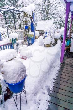 The front porch of a home in Burien, Washington is buried in snow.