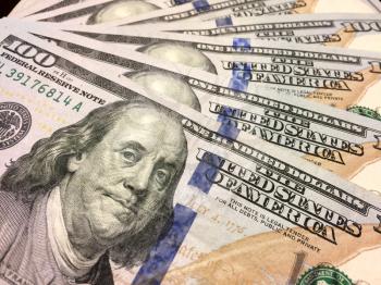 American one hundred dollar bills with Benjamin Franklin horizontal