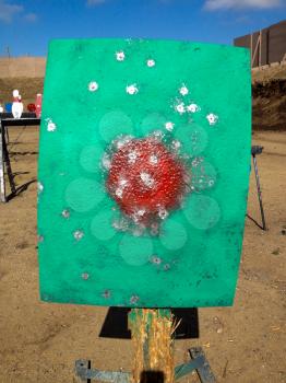 Metal targets at shooting range outdoor firearm rifle shotgun practice sunny