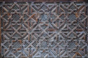 Elaborate decoration of carved wooden patterns in Madrasa Bou Inani, Fez, Morocco
