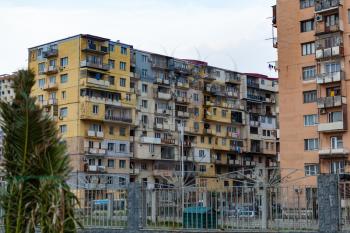 Batumi, Georgia - 25 March 2016: Soviet block of flats with unauthorized changes in balconies