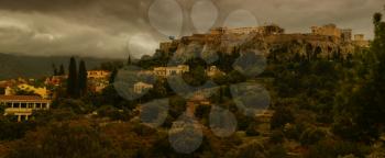View of Acropolis on the top of the mountain in Athens, Greece