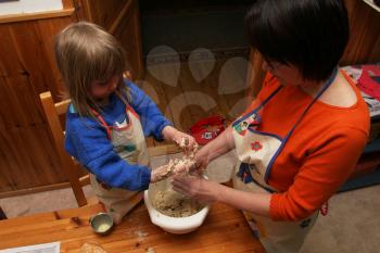 Royalty Free Photo of a Mother and Daughter Cooking