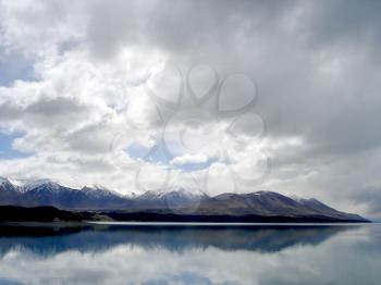 Royalty Free Photo of Mountains Reflected in Water