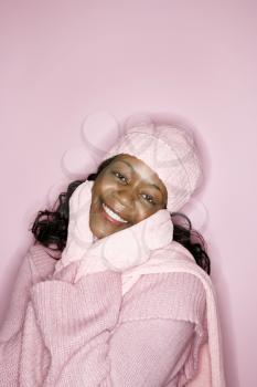 Royalty Free Photo of a Smiling Woman Wearing Winter Clothing