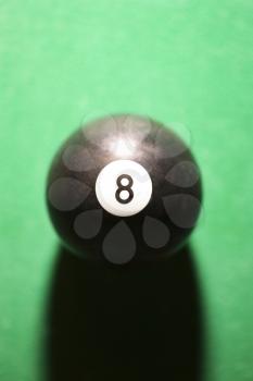 Royalty Free Photo of a Close-up of an Eight Ball on a Green Billiards Table