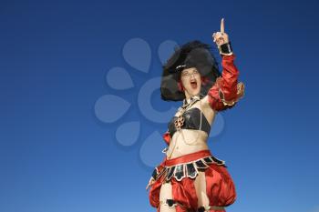 Royalty Free Photo of a Woman Dressed in a Pirate Costume