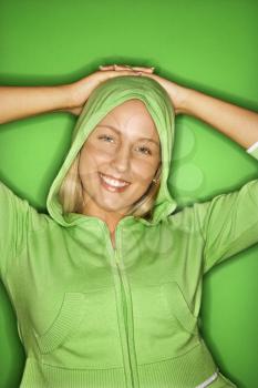 Royalty Free Photo of a Portrait of a Teen Girl Wearing a Green Hoodie