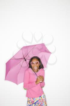 Royalty Free Photo of a Portrait of a Teen Girl Holding a Pink Umbrella