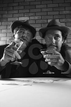 Royalty Free Photo of Two Men Drinking Martinis 