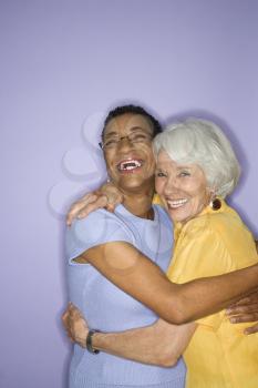 Royalty Free Photo of Older Women Hugging
