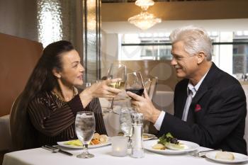 Royalty Free Photo of an Older Couple Dining at a Restaurant