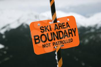 Royalty Free Photo of a Ski Area Trail Boundary Sign