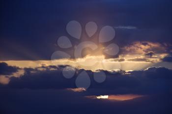 Royalty Free Photo of Sunbeams Coming Through Clouds at Sunrise Over Maui, Hawaii, USA