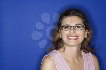 Royalty Free Photo of a Woman Wearing Eyeglasses Smiling