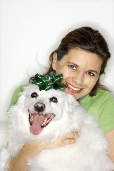 Royalty Free Photo of a Woman Holding a Dog