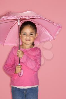Royalty Free Photo of a Little Girl Holding an Umbrella